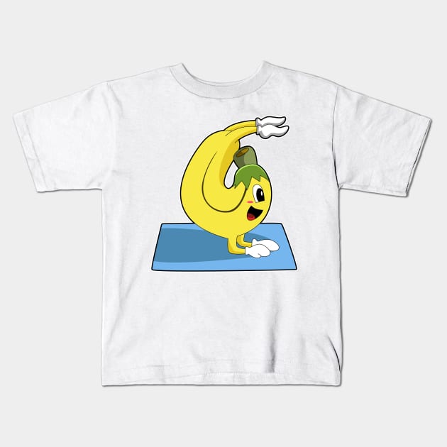 Banana at Yoga on Yoga mat Kids T-Shirt by Markus Schnabel